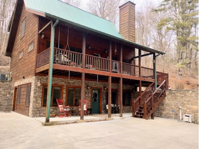 back of house featuring a patio area