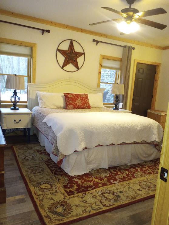 bedroom featuring ceiling fan and ornamental molding