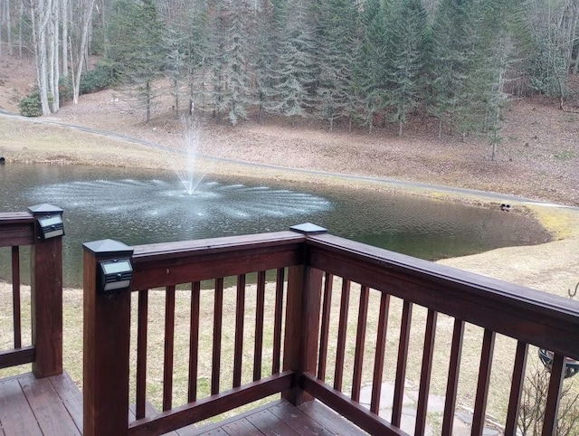 deck featuring a water view