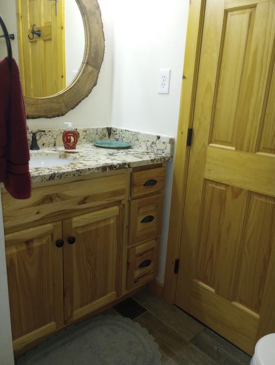 bathroom featuring vanity and wood-type flooring