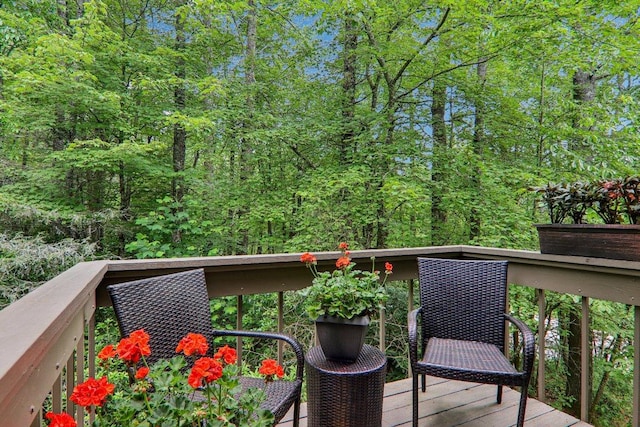 98 Dogwood Knob Ln Unit 3A, Sapphire, NC 28774 - wooden deck with a wooded view