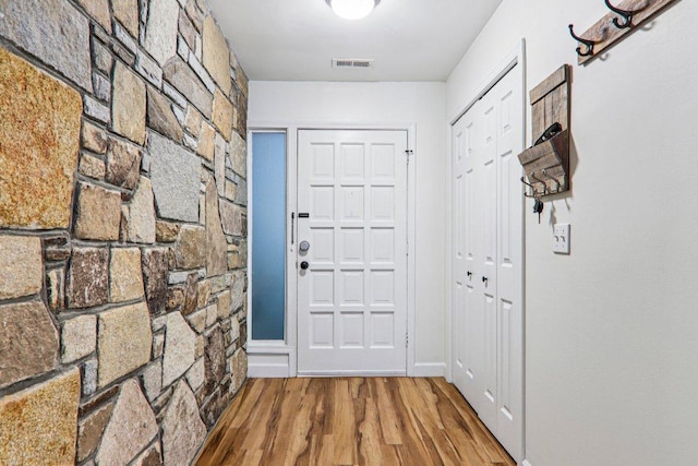 98 Dogwood Knob Ln Unit 3A, Sapphire, NC 28774 - doorway to outside featuring wood finished floors and baseboards