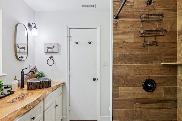98 Dogwood Knob Ln Unit 3A, Sapphire, NC 28774 - full bathroom featuring vanity and a tile shower