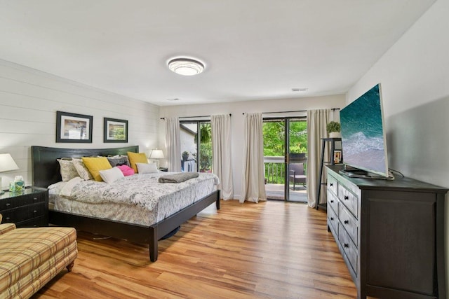 98 Dogwood Knob Ln Unit 3A, Sapphire, NC 28774 - bedroom with access to exterior and light wood-style flooring