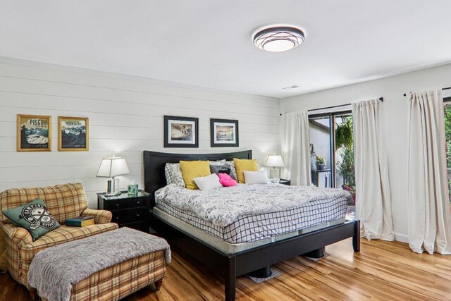 98 Dogwood Knob Ln Unit 3A, Sapphire, NC 28774 - bedroom featuring light wood-style floors and access to outside