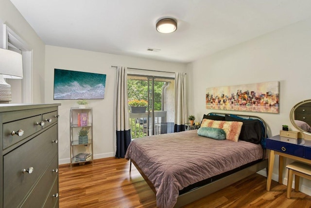 98 Dogwood Knob Ln Unit 3A, Sapphire, NC 28774 - bedroom featuring light wood-style floors and access to exterior