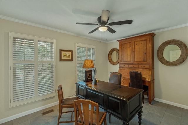 tiled home office featuring ceiling fan, baseboards, visible vents, and ornamental molding