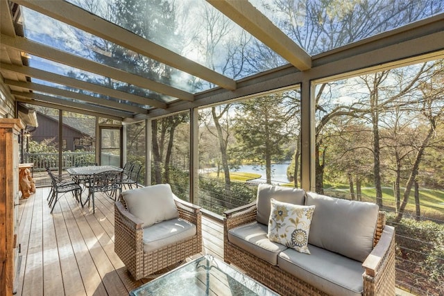 sunroom with a water view