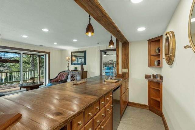 kitchen featuring brown cabinetry, baseboards, open shelves, recessed lighting, and a sink