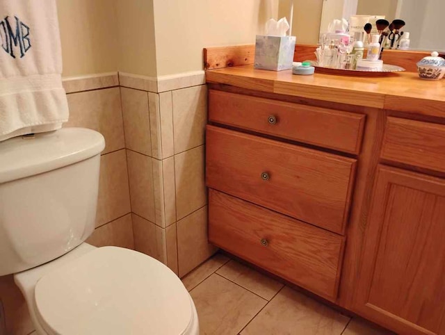 172 Moon Ridge Dr, Sky Valley, GA 30537 - bathroom featuring toilet, vanity, a wainscoted wall, and tile patterned flooring