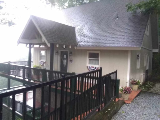 172 Moon Ridge Dr, Sky Valley, GA 30537 - doorway to property with a shingled roof and stucco siding