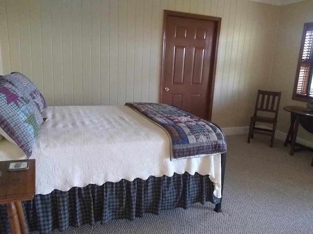 172 Moon Ridge Dr, Sky Valley, GA 30537 - carpeted bedroom with baseboards and wooden walls