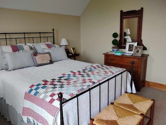 172 Moon Ridge Dr, Sky Valley, GA 30537 - carpeted bedroom featuring vaulted ceiling