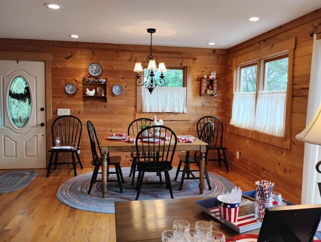 172 Moon Ridge Dr, Sky Valley, GA 30537 - dining area with wood finished floors, a chandelier, recessed lighting, and wooden walls