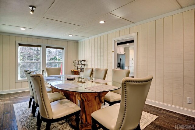 dining area with dark wood-type flooring