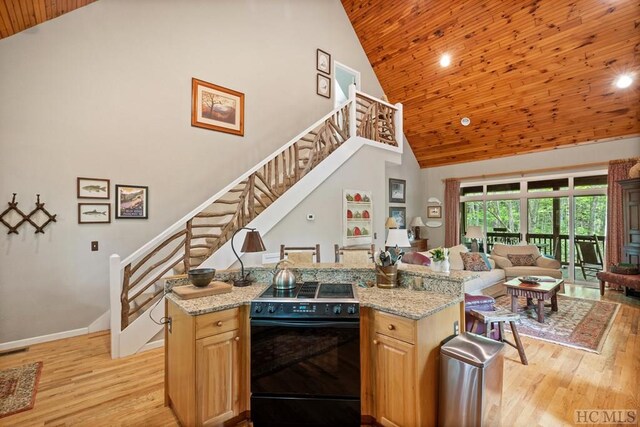 kitchen featuring high vaulted ceiling, wooden ceiling, light stone countertops, and black electric range