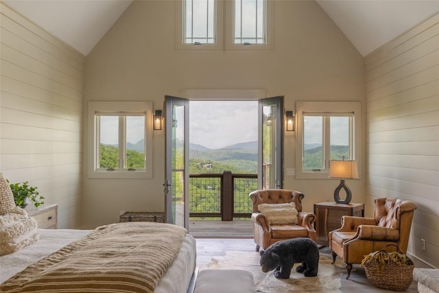 494 E Ridge Rd, Cashiers, NC 28717 - bedroom featuring high vaulted ceiling, access to exterior, multiple windows, wooden walls, and a mountain view