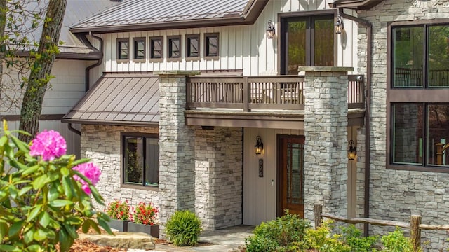 494 E Ridge Rd, Cashiers, NC 28717 - property entrance featuring a standing seam roof, a balcony, and metal roof