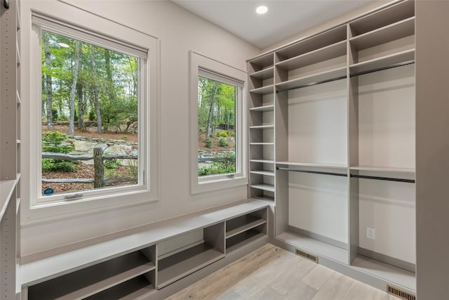 494 E Ridge Rd, Cashiers, NC 28717 - spacious closet featuring wood finished floors