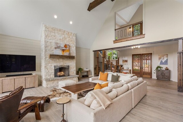 494 E Ridge Rd, Cashiers, NC 28717 - living area with high vaulted ceiling, a fireplace, wood finished floors, beam ceiling, and recessed lighting