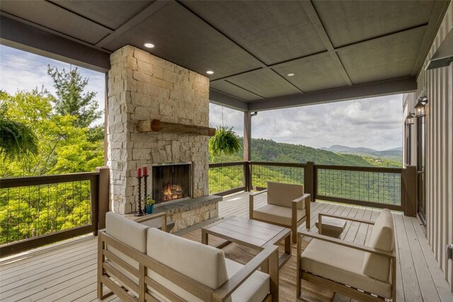 494 E Ridge Rd, Cashiers, NC 28717 - wooden terrace featuring an outdoor living space with a fireplace