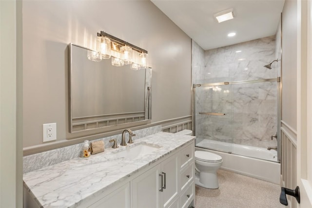 494 E Ridge Rd, Cashiers, NC 28717 - full bathroom with toilet, vanity, and bath / shower combo with glass door