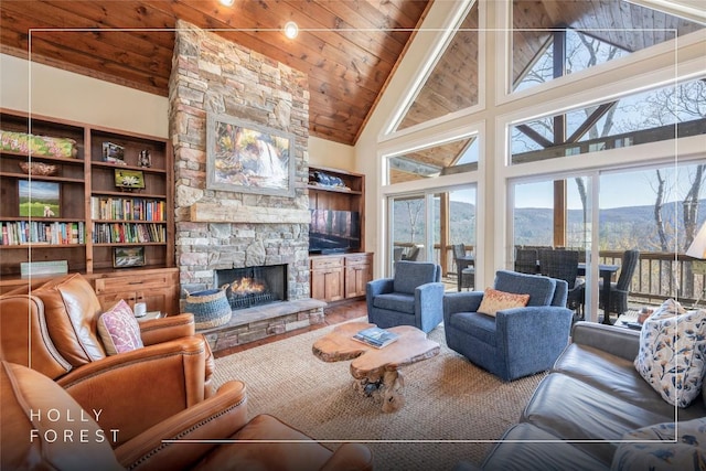 83 Flyaway Cir, Sapphire, NC 28774 - living area with a fireplace, wood ceiling, and high vaulted ceiling