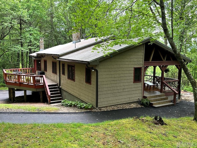 view of home's exterior with a deck