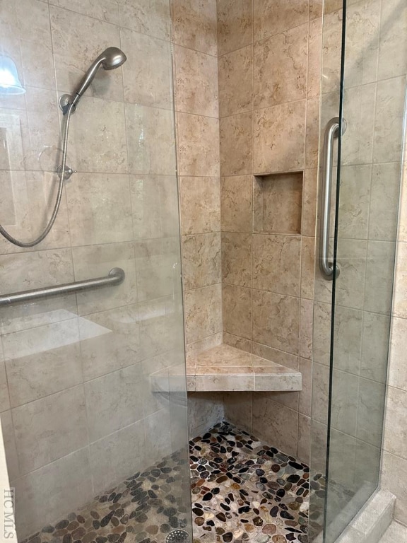 bathroom with an enclosed shower