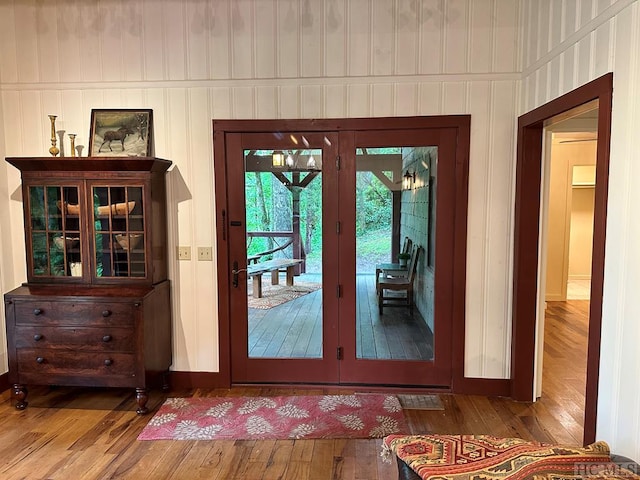 doorway to outside featuring french doors and hardwood / wood-style floors