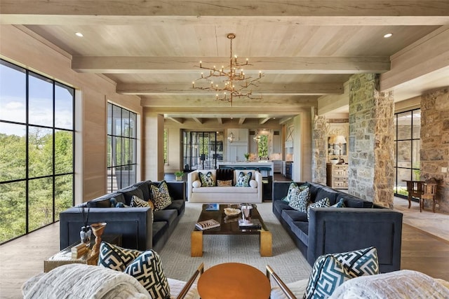 893 High Mountain Dr, Cashiers, NC 28717 - sunroom / solarium featuring a chandelier and beamed ceiling