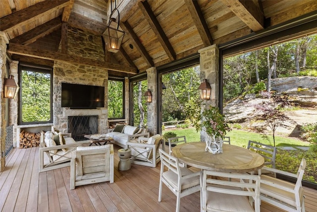 893 High Mountain Dr, Cashiers, NC 28717 - sunroom / solarium featuring plenty of natural light, outdoor dining space, and an outdoor living space with a fireplace