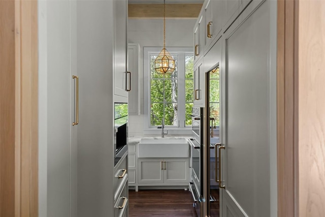893 High Mountain Dr, Cashiers, NC 28717 - bathroom featuring wood finished floors, a sink, and a chandelier