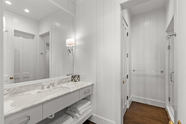 893 High Mountain Dr, Cashiers, NC 28717 - bathroom with wood finished floors, vanity, a stall shower, and recessed lighting