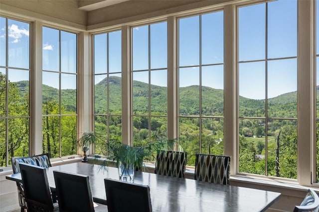 893 High Mountain Dr, Cashiers, NC 28717 - sunroom with a mountain view, healthy amount of natural light, and a wooded view