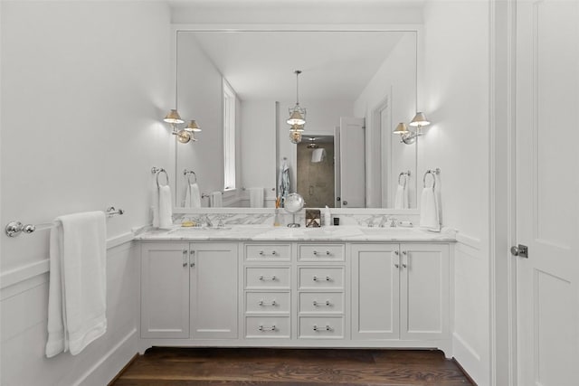 893 High Mountain Dr, Cashiers, NC 28717 - bathroom with double vanity and wood finished floors