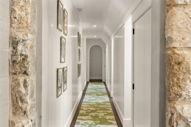 893 High Mountain Dr, Cashiers, NC 28717 - hallway with arched walkways, baseboards, recessed lighting, and carpet flooring