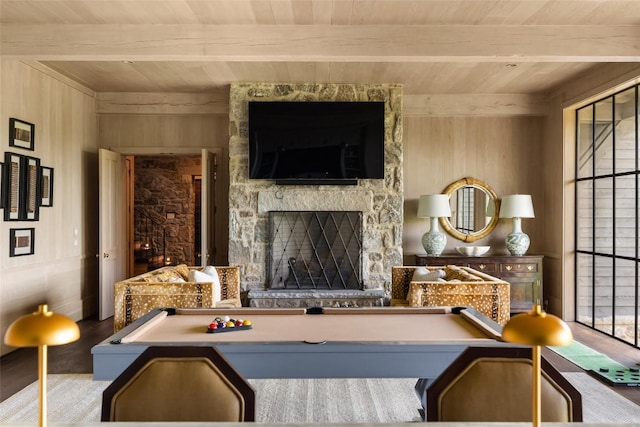 893 High Mountain Dr, Cashiers, NC 28717 - living room with wooden ceiling with exposed beams, wood walls, a stone fireplace, and wood finished floors