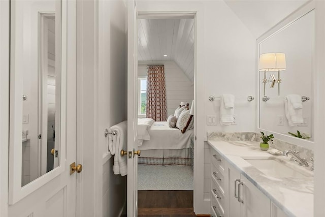 893 High Mountain Dr, Cashiers, NC 28717 - bathroom with ensuite bathroom, vanity, and wood finished floors