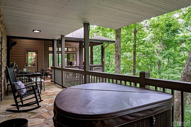 view of patio with a hot tub