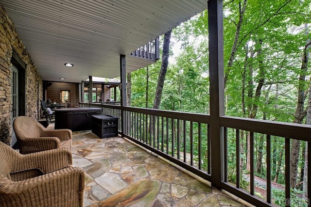 view of patio featuring a hot tub