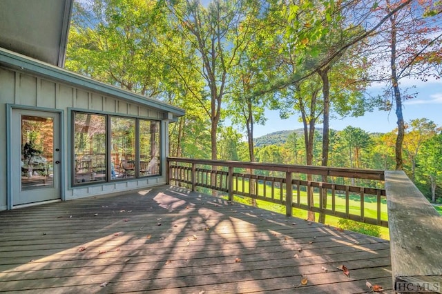 wooden terrace with a mountain view