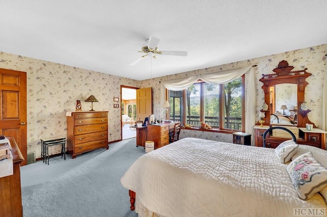 bedroom with ceiling fan and carpet flooring