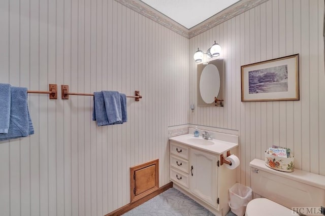 bathroom with vanity and toilet