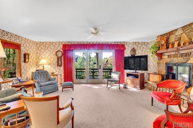 living room with carpet floors and ceiling fan