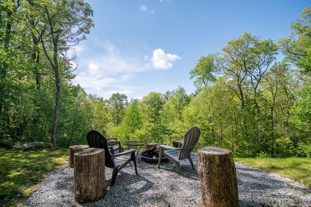 view of patio / terrace featuring a fire pit