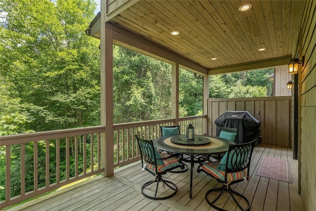 115 Falls Ct W, Highlands, NC 28741 - wooden terrace with area for grilling, outdoor dining space, and a view of trees