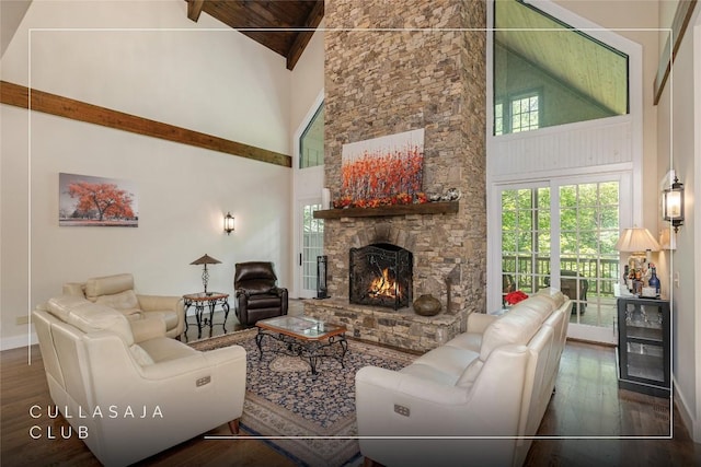115 Falls Ct W, Highlands, NC 28741 - living room featuring high vaulted ceiling, wood finished floors, a fireplace, and a wood ceiling with exposed beams