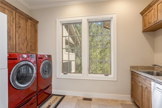115 Falls Ct W, Highlands, NC 28741 - laundry area featuring washing machine and dryer and ornamental molding