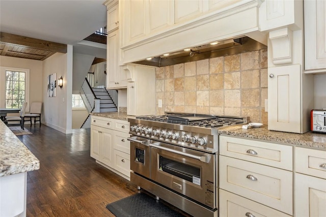 115 Falls Ct W, Highlands, NC 28741 - kitchen with double oven range, custom exhaust hood, tasteful backsplash, dark wood-type flooring, and light stone countertops
